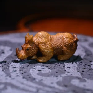 Armored Rhino Antler Figurine — product view 1